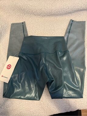 Lululemon Wunder Train HR Tight 25” Foil storm teal